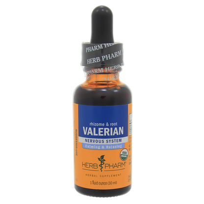 A 1 fluid ounce amber glass dropper bottle of Herb Pharm Valerian rhizome & root herbal supplement, featuring an orange and blue label with a black dropper cap.