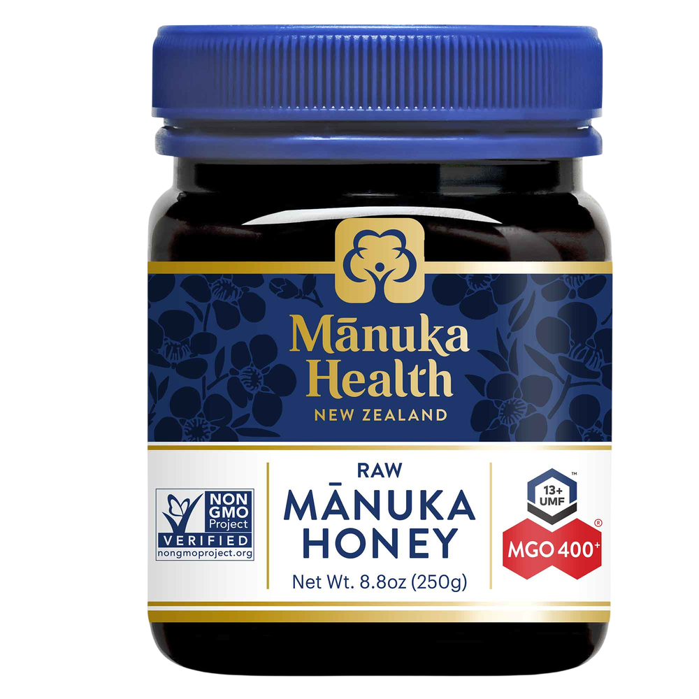 Manuka Health raw Manuka MGO 400+ honey jar with blue lid on a white background