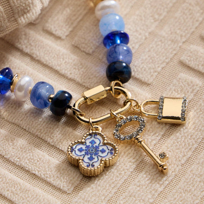 Vibrant Beaded Bracelet | Gold-Tone Trio Charms: NT / ONE
